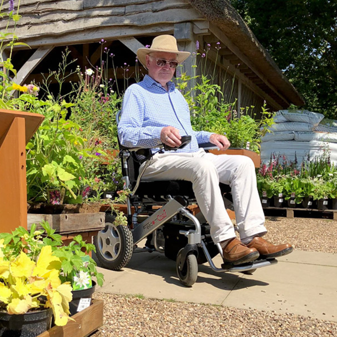 Showing A08L being used by a gentleman in a garden centre.