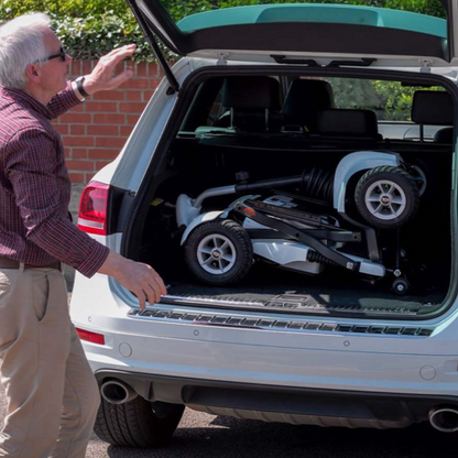 Showing the TGA Maximo Plus Mobility Scooter fitting into a 4 by 4 car boot when its folded. 